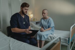 A male nurse looking after a patient